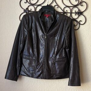 Brown Jacket with 2 front zip pockets.